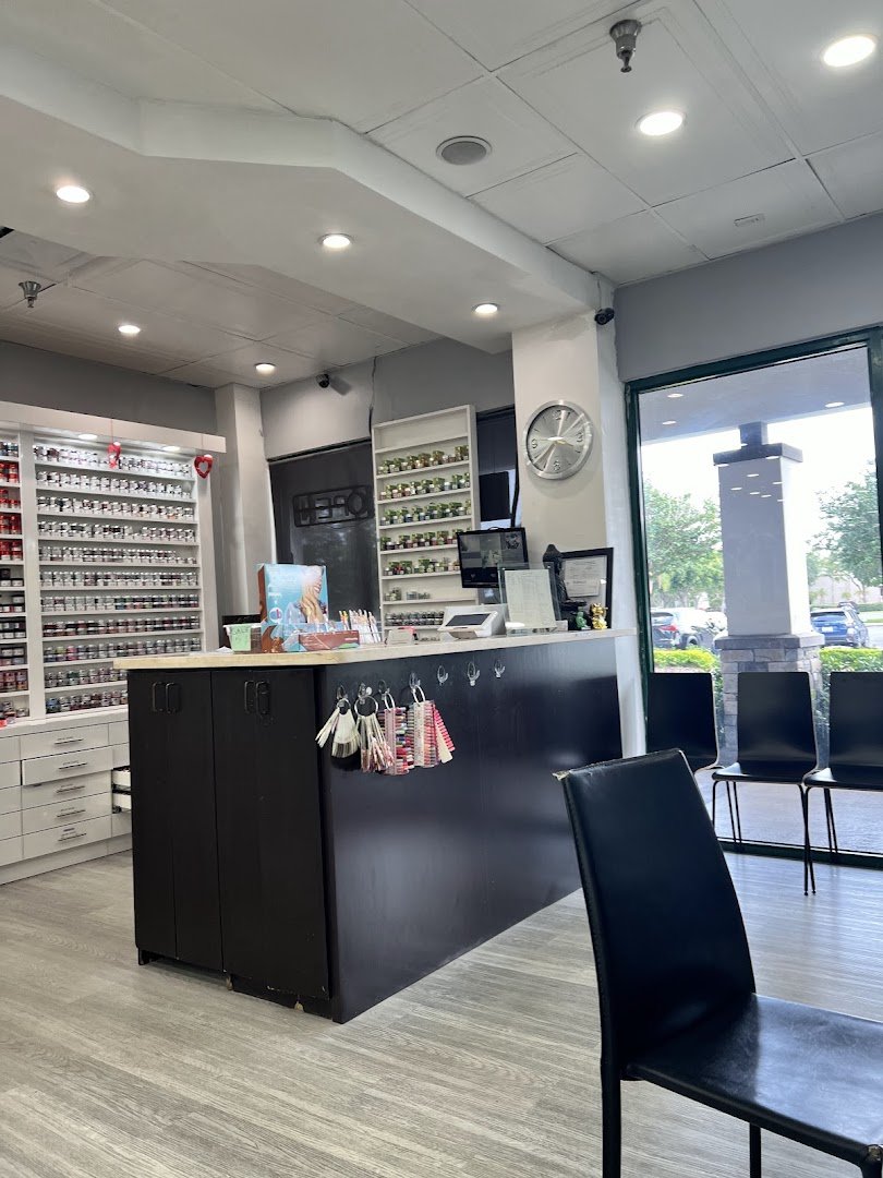 Manicure station with tools and polish colors.