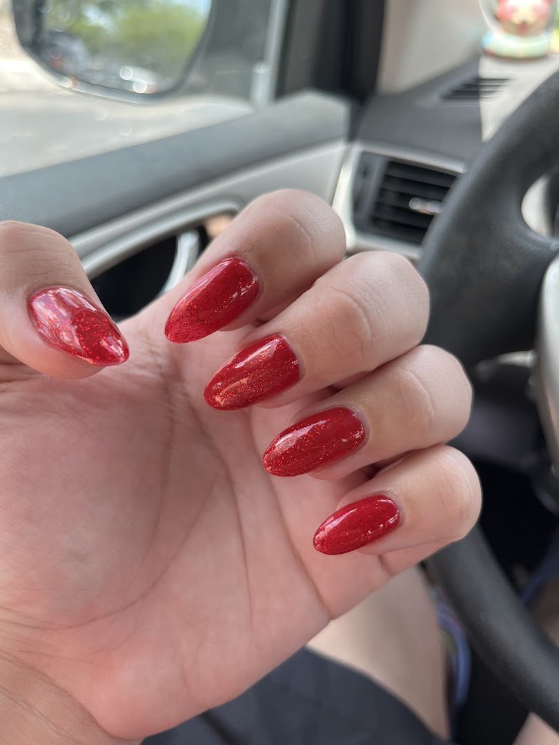 Close view of colorful nail lacquer displays.